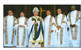 Cardinal Keeler with the five newly ordained deacons